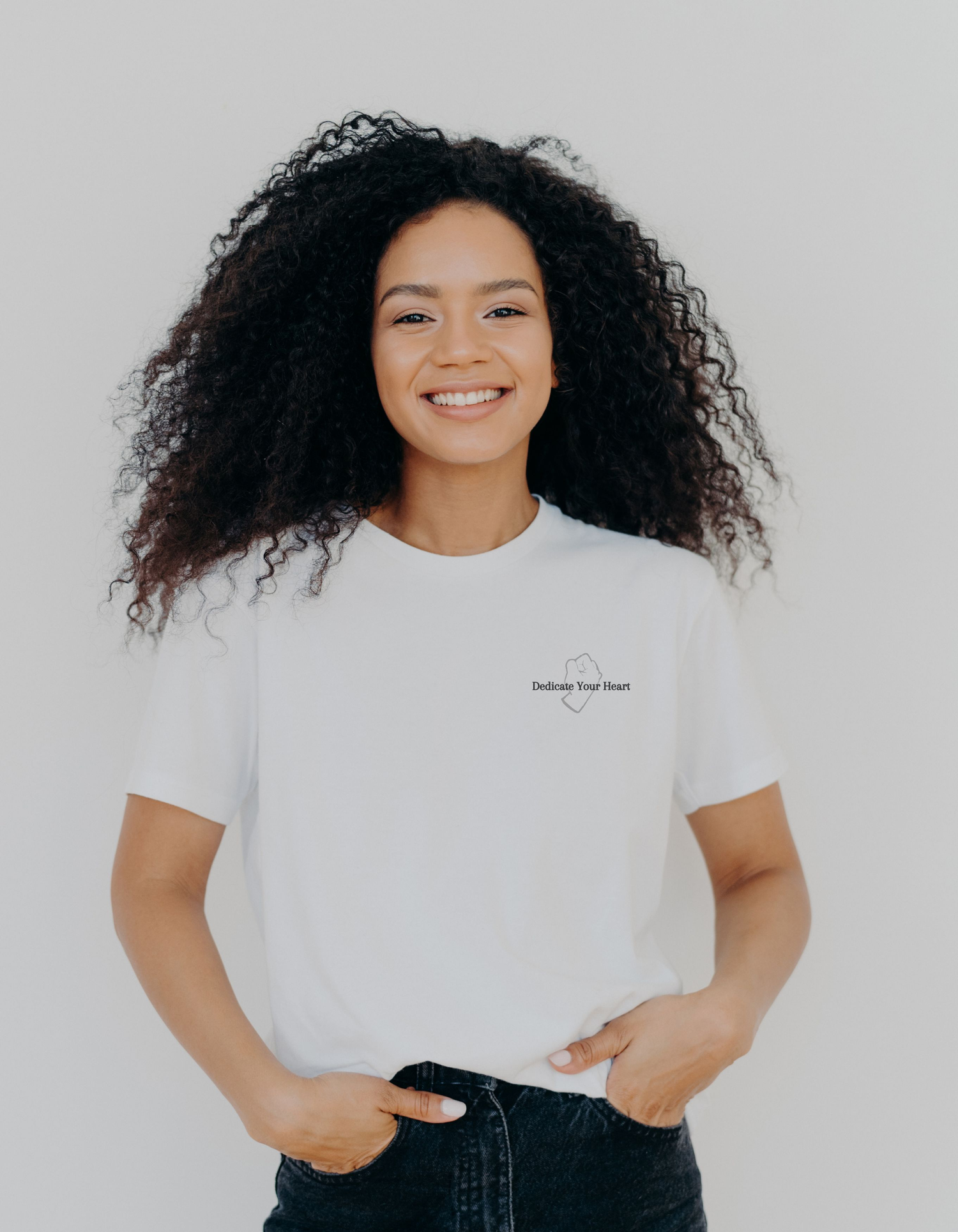 Female model with dedicate your heart graphic tee