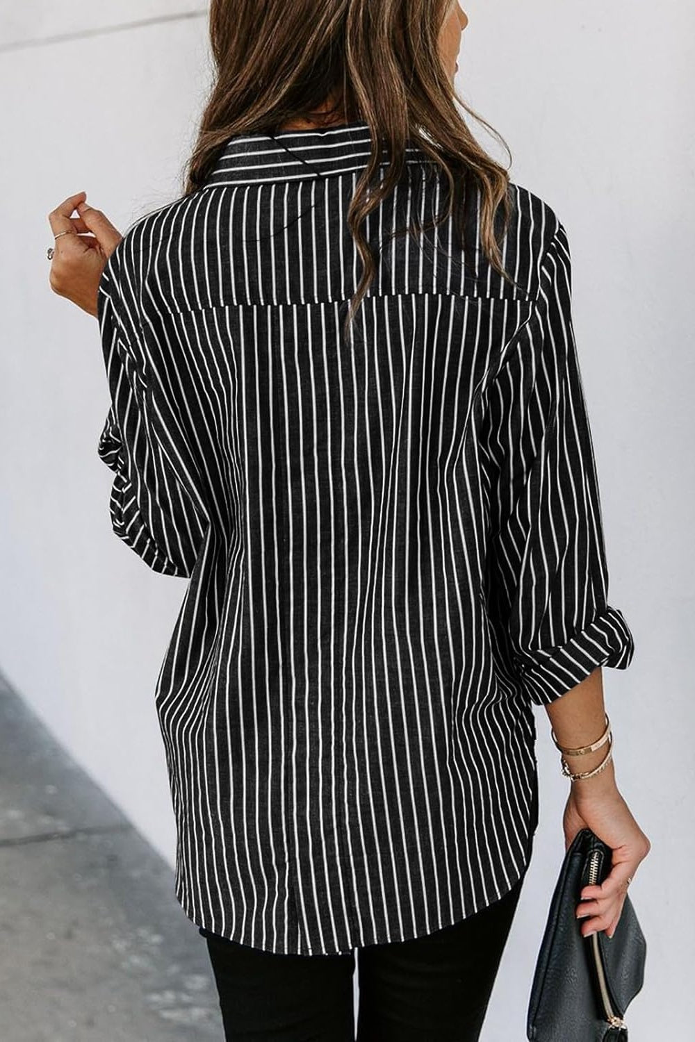 Back of Black and white stripe button up shirt 