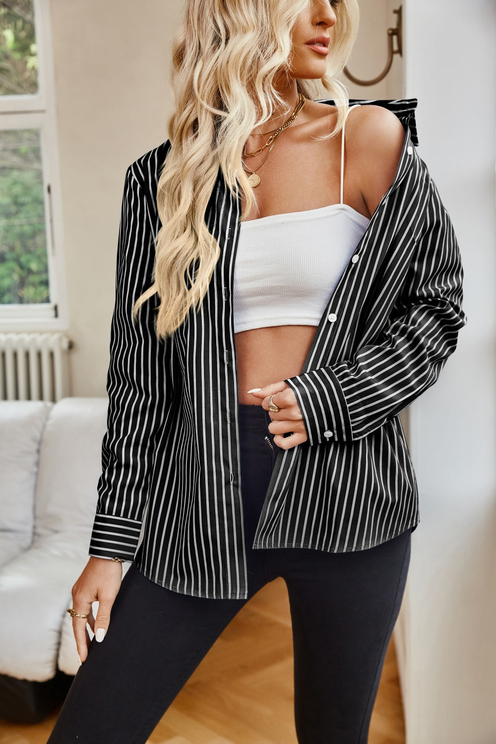 Black and white vertical striped collared shirt