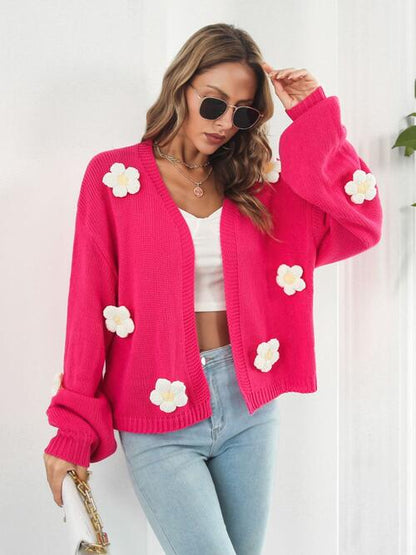 Hot pink cardigan with 3D white flowers